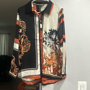 Orange white and black blouse size XL